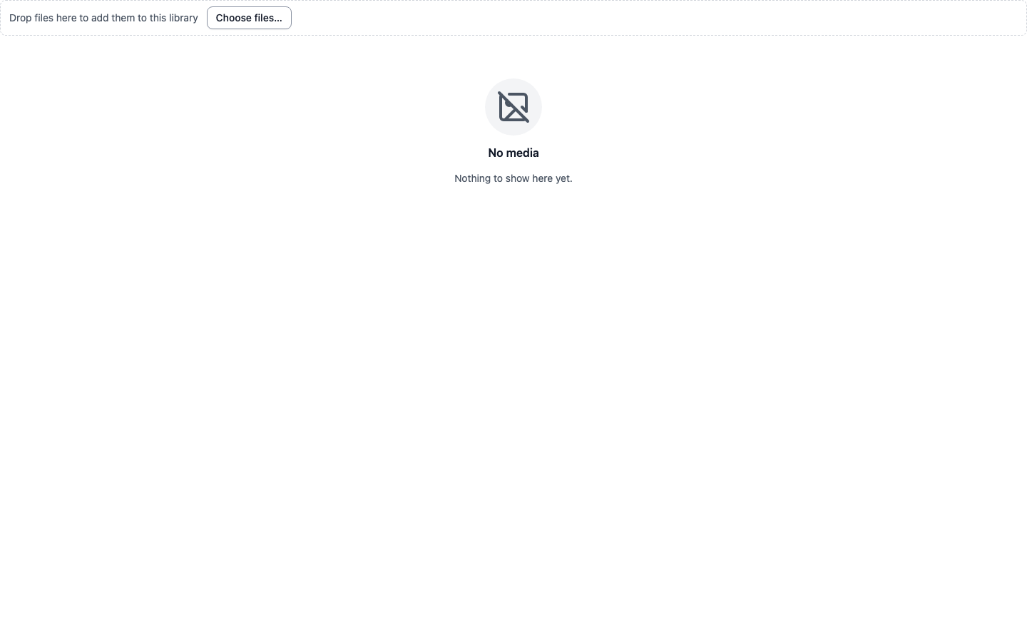 The media library engine inside a generated app: a drag-and-drop upload bar with a file chooser, above an empty gallery awaiting its first files.